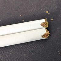 Cigarette tube ripped from filling machine